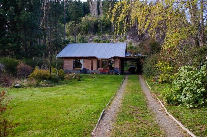 Cabaña con amplio jardín a 10min del centro