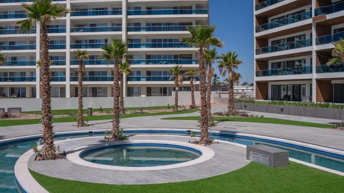 R202: Stylish 1-Bedroom Condo with Private Balcony, King Bedroom, and Relaxing Ocean Views