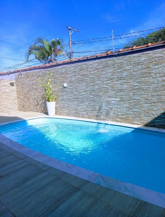 Kitnet com piscina em cond fechado a 200 m da praia com wi-fi