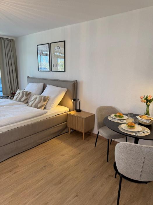 Modernes Seeblick Apartment mit Sauna und Poolnutzung