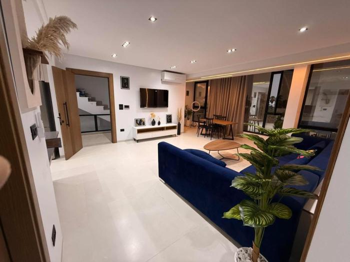 Appartement Luxe S2-900m-plage-Fibre-Smart TV-Parking privé