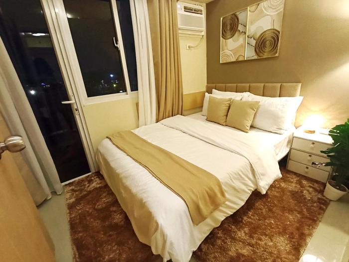 Cozy Condo Near Mall and Airport with Wi-Fi and Netflix