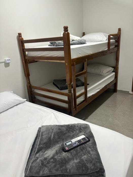 Perto de Tudo - Centro Bandeirantes PR com Ar, TV Smart, Ar Condicionado e Frigobar