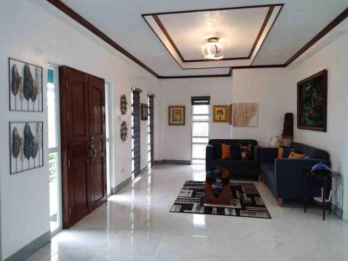 House & Swimming Pool on a Hill