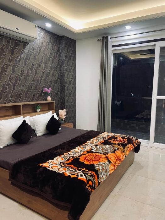 Luxury 2bhk White lotus apartment by Madanan