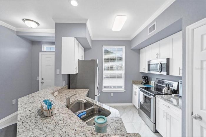 Admirals Walk Ground Floor Condo in Gated Comm