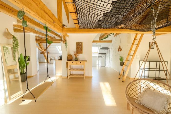 Aussergewöhnliche Loft Wohnung mit Hängenetzen und Schaukeln