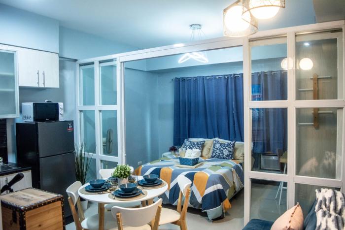 Elivion Staycations at McKinley Hill, near Venice, BGC, with Pool & Wifi