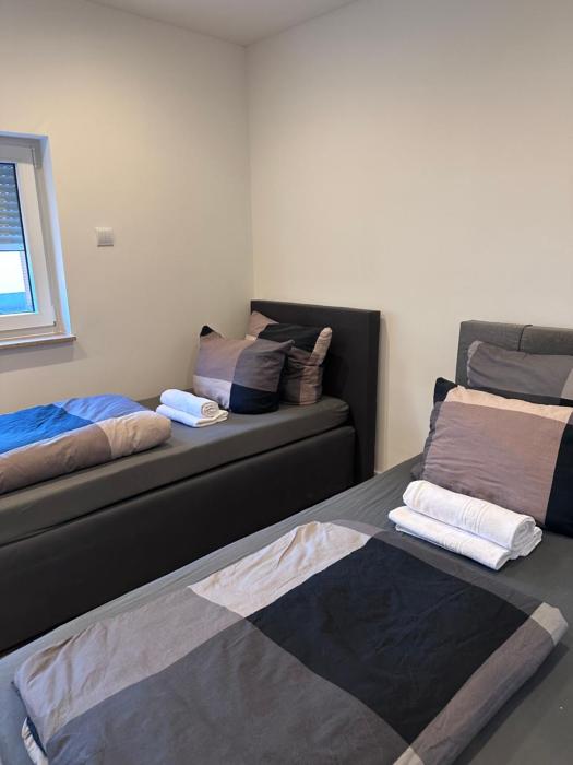 Apartment bis zu 6 Einzelbetten Stellplatz Wifi