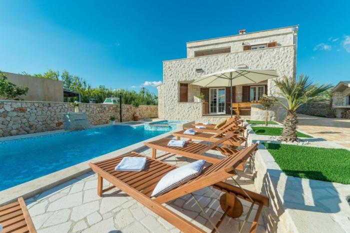 Villa -pool with whirpool and waterfall near sandy beach - by TRAVELER tourist agency Krk ID 2174
