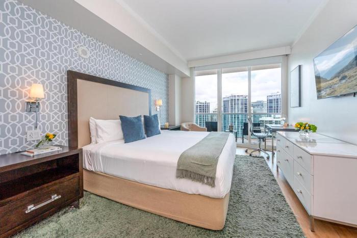 Elevated Grove Escape with Balcony & Bay Views-Includes Parking