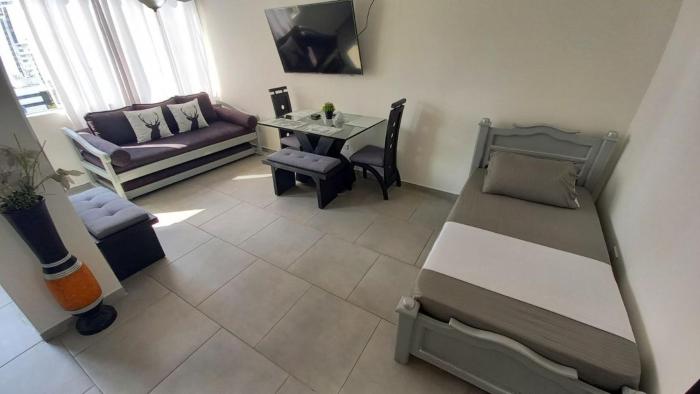 Apartamento Cerca a la playa, Piscina, Wifi, AC