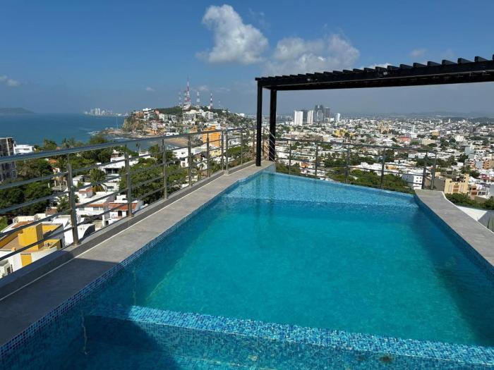 Depa con terraza panoramica al mar y la ciudad