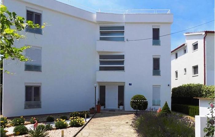 Amazing Apartment In Pirovac With Lake View