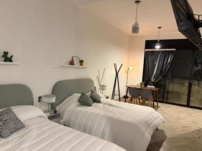 Hotel ënxë habitación grande camas queen