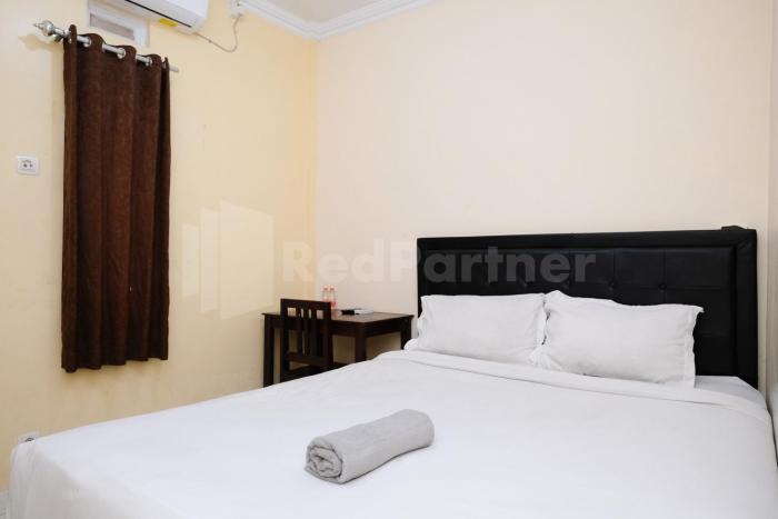 Mas Klimis Guesthouse Pakuwon Mall Mitra RedDoorz