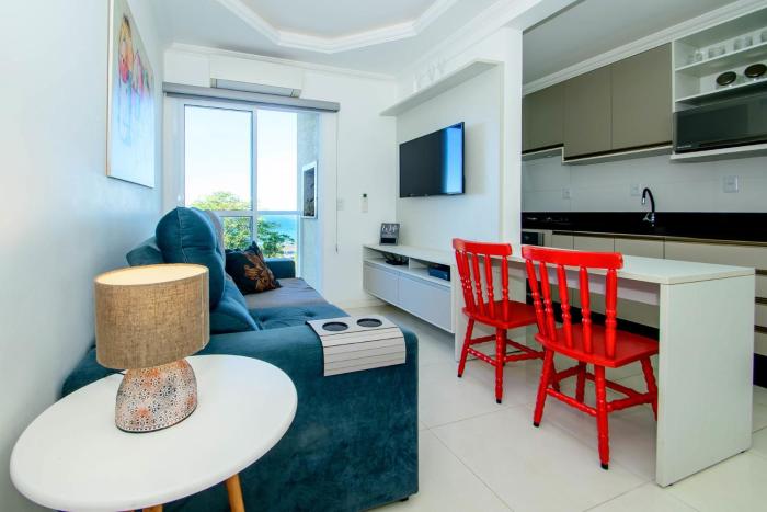 Apto climatizado c garagem e vista mar ING9303