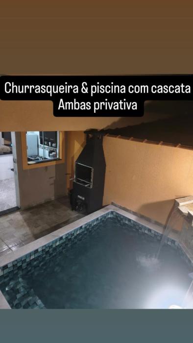 Casa praia de condomínio com piscina e churrasqueira