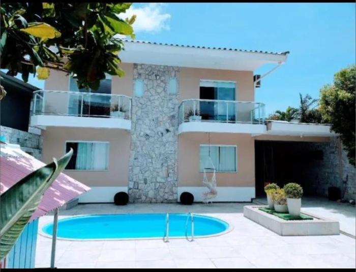 Casa com pisicna Pé na Areia 50m do mar