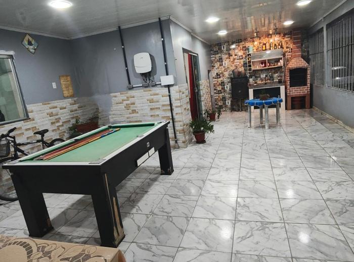 Quarto em casa de família