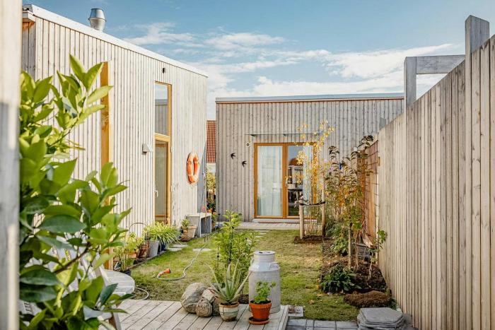 Wooden Home Among Apple Trees With Ocean View