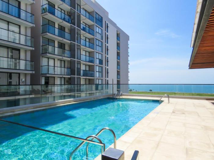 Lujo Caribeño Apartamento con vista al mar y psicina