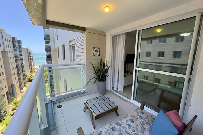 JTR beira-mar com varanda, ar, cozinha completa, quarto para até 4 pessoas