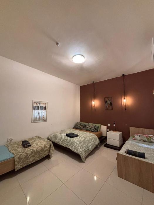 4 Person Sliema Spacious Room Airconditioned and Self Check