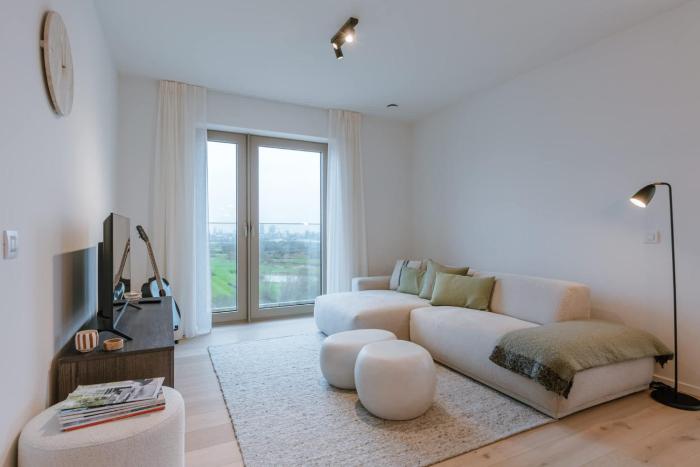 Modern Beach Apartment with Balcony & Parking