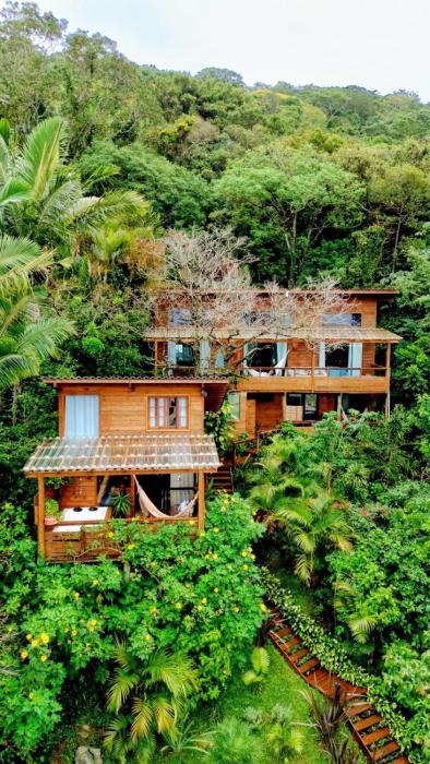 Casa espaçosa à 5min da praia Floripa vista pro mar de 2 até 12 hóspedes