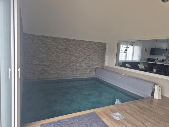 Gîte Un instant de rêve à Dorlisheim, piscine intérieure chauffée, sauna