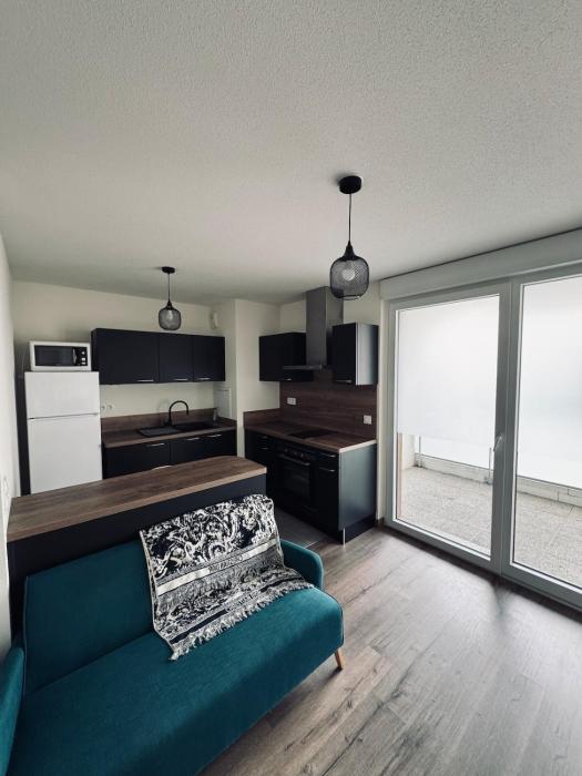 Cozy apartment with balcony and secure parking