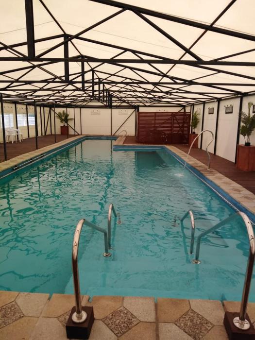 Adilauquén Cabañas, Piscina Temperada y Tinajas Calientes