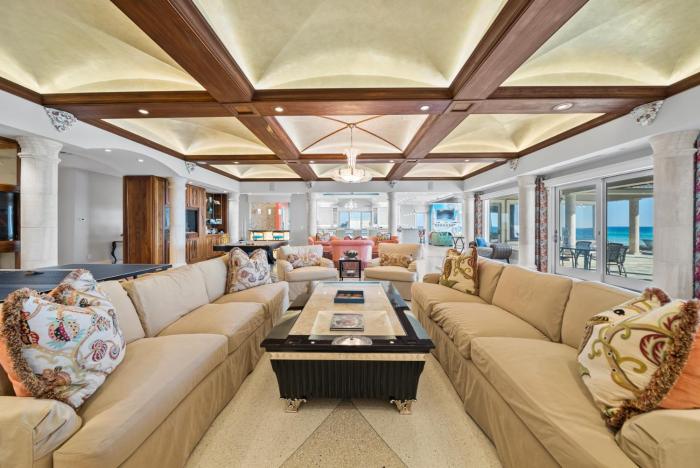 Beach Castle l Private Beachfront home with heated pool ping pong and pool table