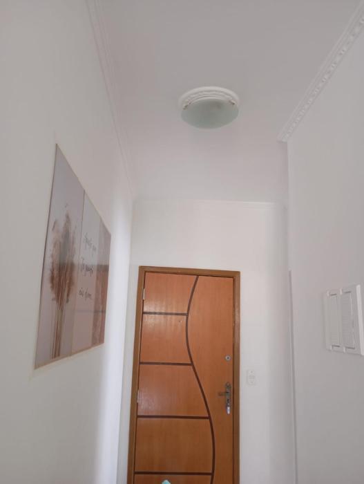 Pé na areia, praia Ocian