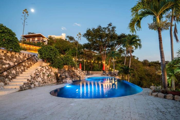 Stunning Mountaintop Property with Stylish Main Home, Private Guesthouse & Infinity Pool