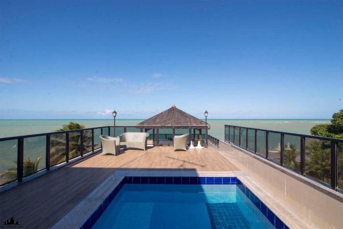 Cobertura pé na areia com piscina exclusiva única