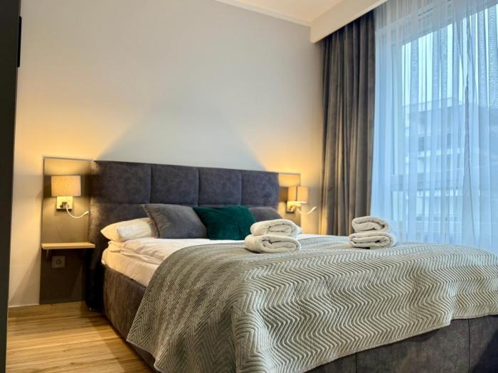 Prywatny parking Malachitowy by Rentoom