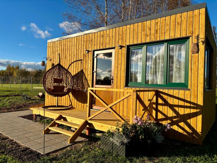 Sajūtu dārza mājiņa