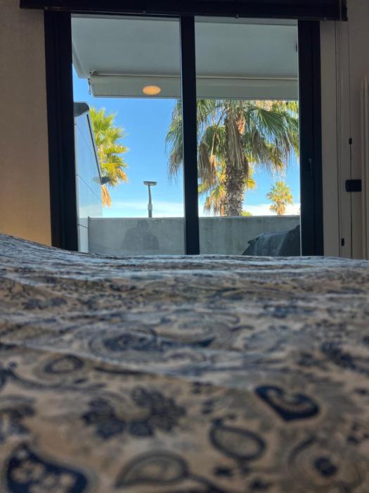 Palm Grove House con terrazzo e box privato