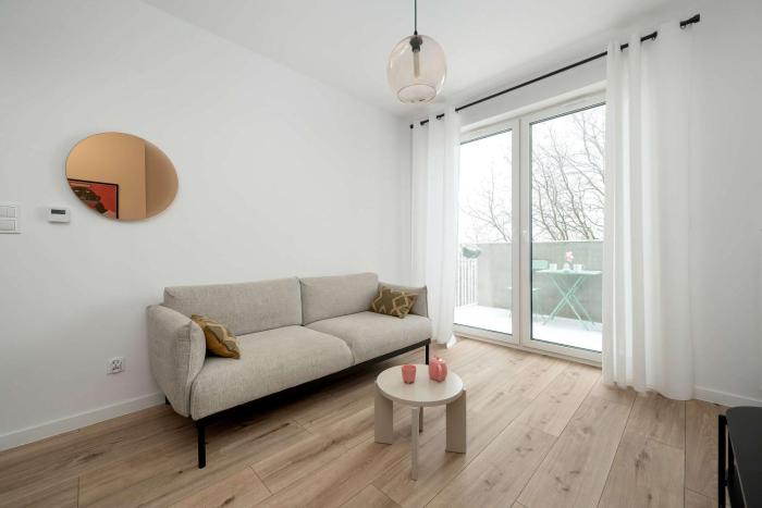 Beige Apartment in Wrocław with Parking and Balcony by Noclegi Renters