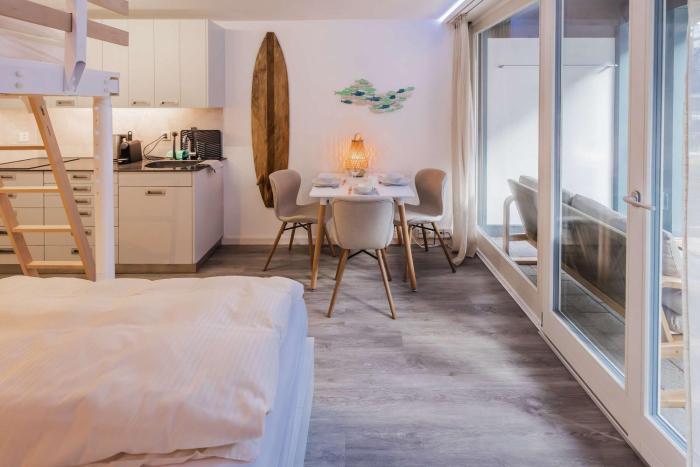 Surfers Deck near Interlaken, at lake with pool