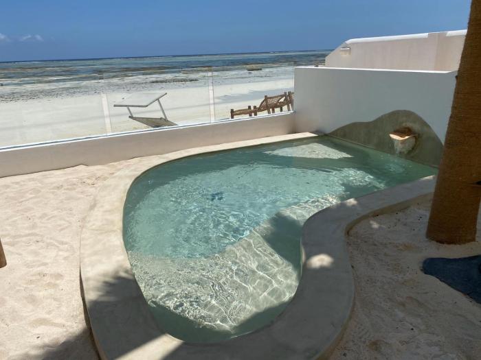 Beachfront Private Apartment with pool