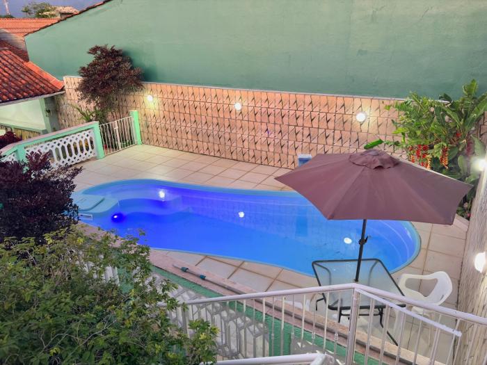 Casa com piscina na praia das palmeiras