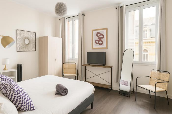 Centre ville - cosy appartement - sous les parapluies