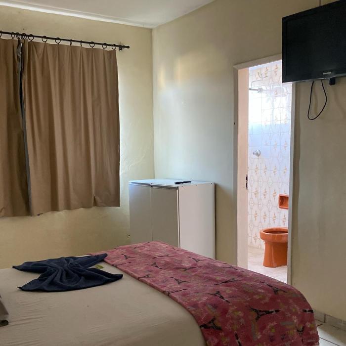 Quarto econômico no centro
