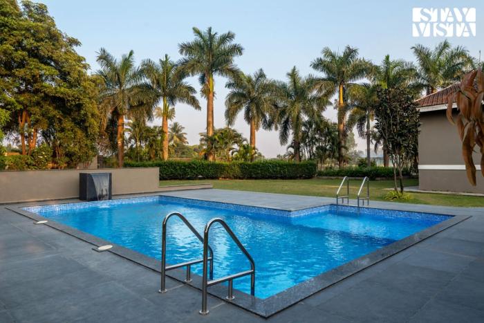 StayVista at Canton Villa with Outdoor Pool, AC, WiFi