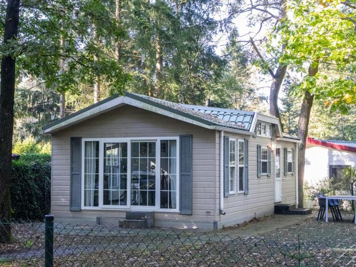 Charming Forest Chalet with Garden & Terrace in Gelderland