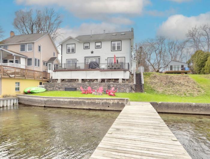 Cast away with kayaks a game room a fire pit and views