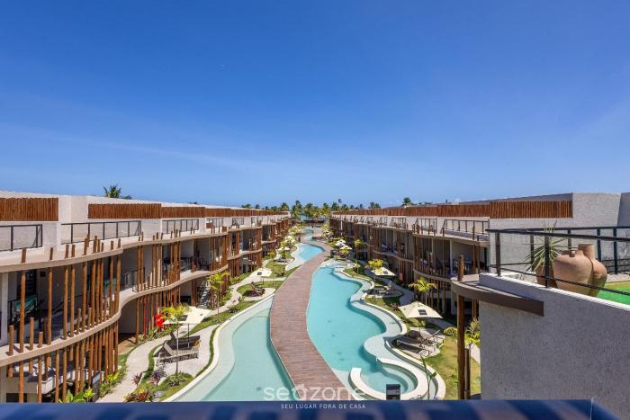 Apartamentos em Cond. com Piscina em Frente à Praia - NVB